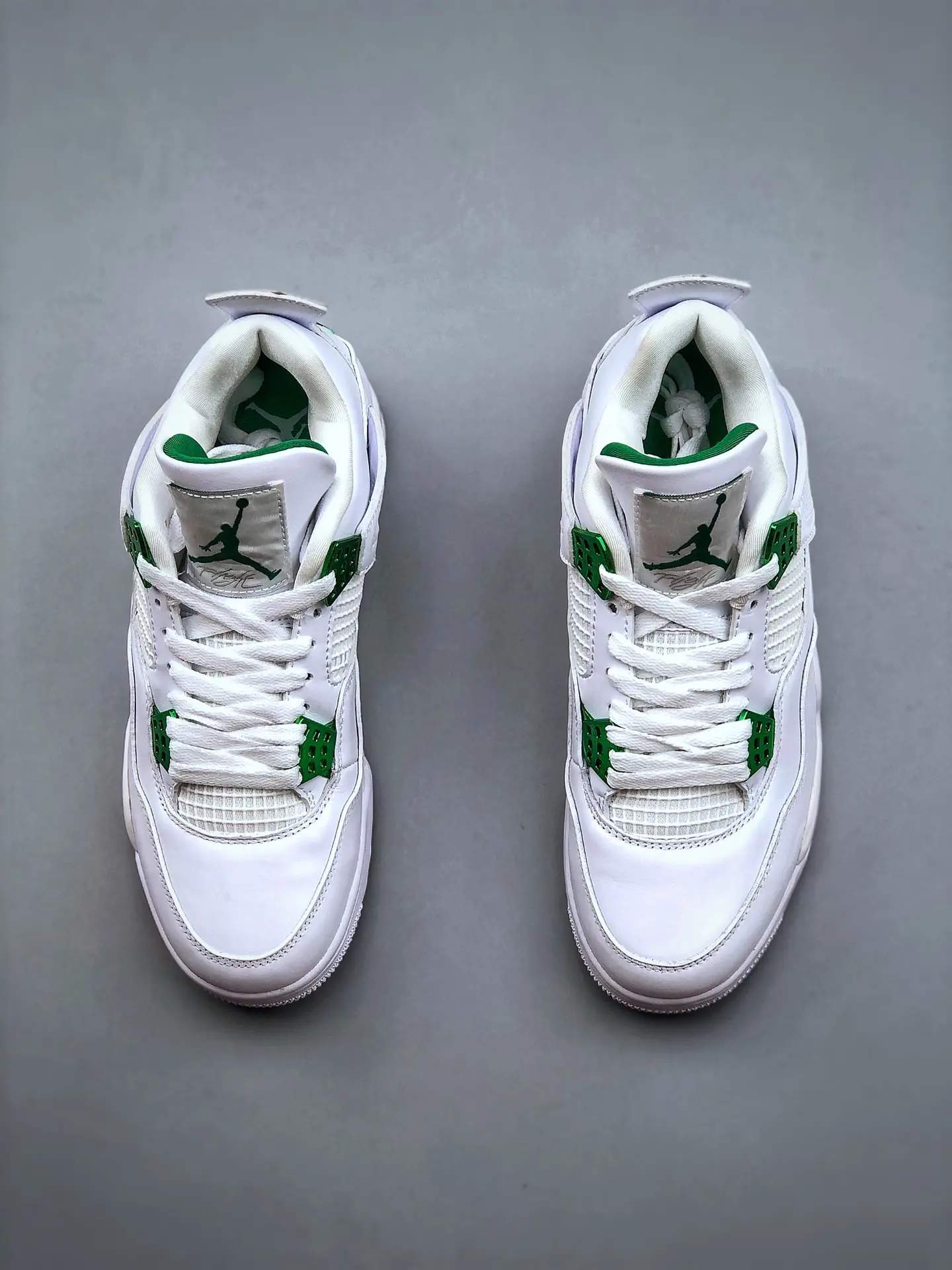 YASSW | Replicating Style: Fake Air Jordan 4 Green Metallic Sneakers