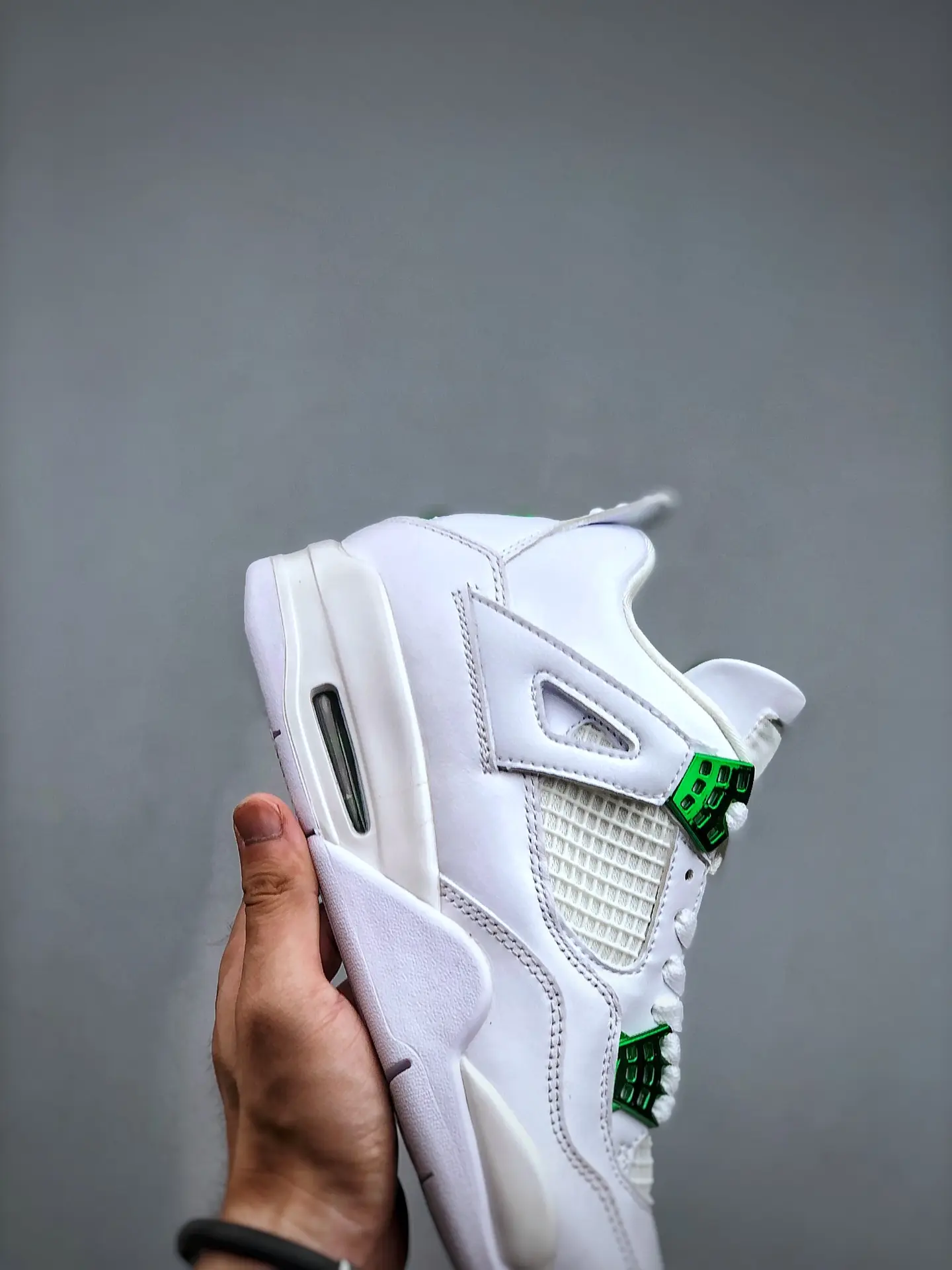 YASSW | Replicating Style: Fake Air Jordan 4 Green Metallic Sneakers