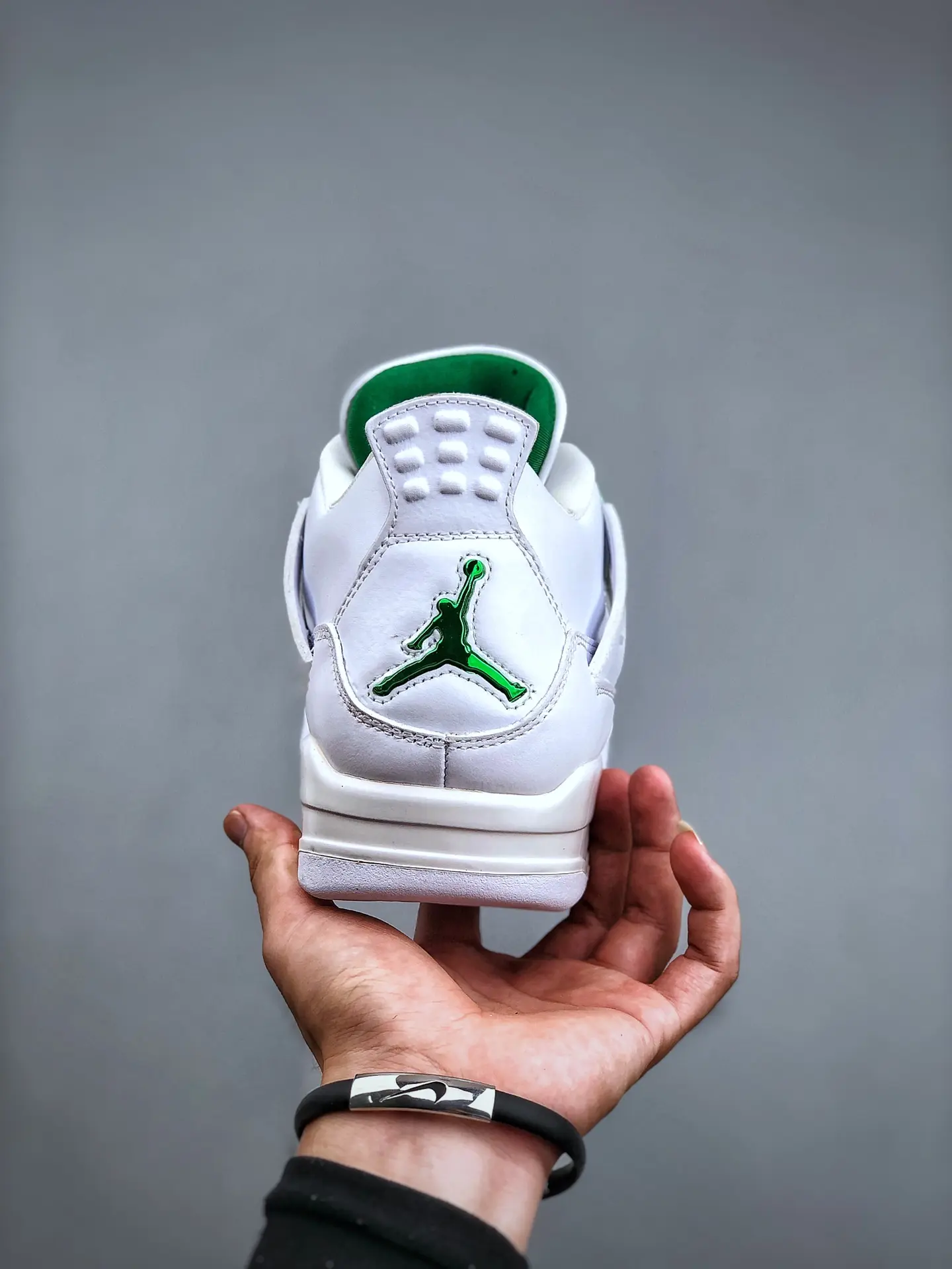 YASSW | Replicating Style: Fake Air Jordan 4 Green Metallic Sneakers