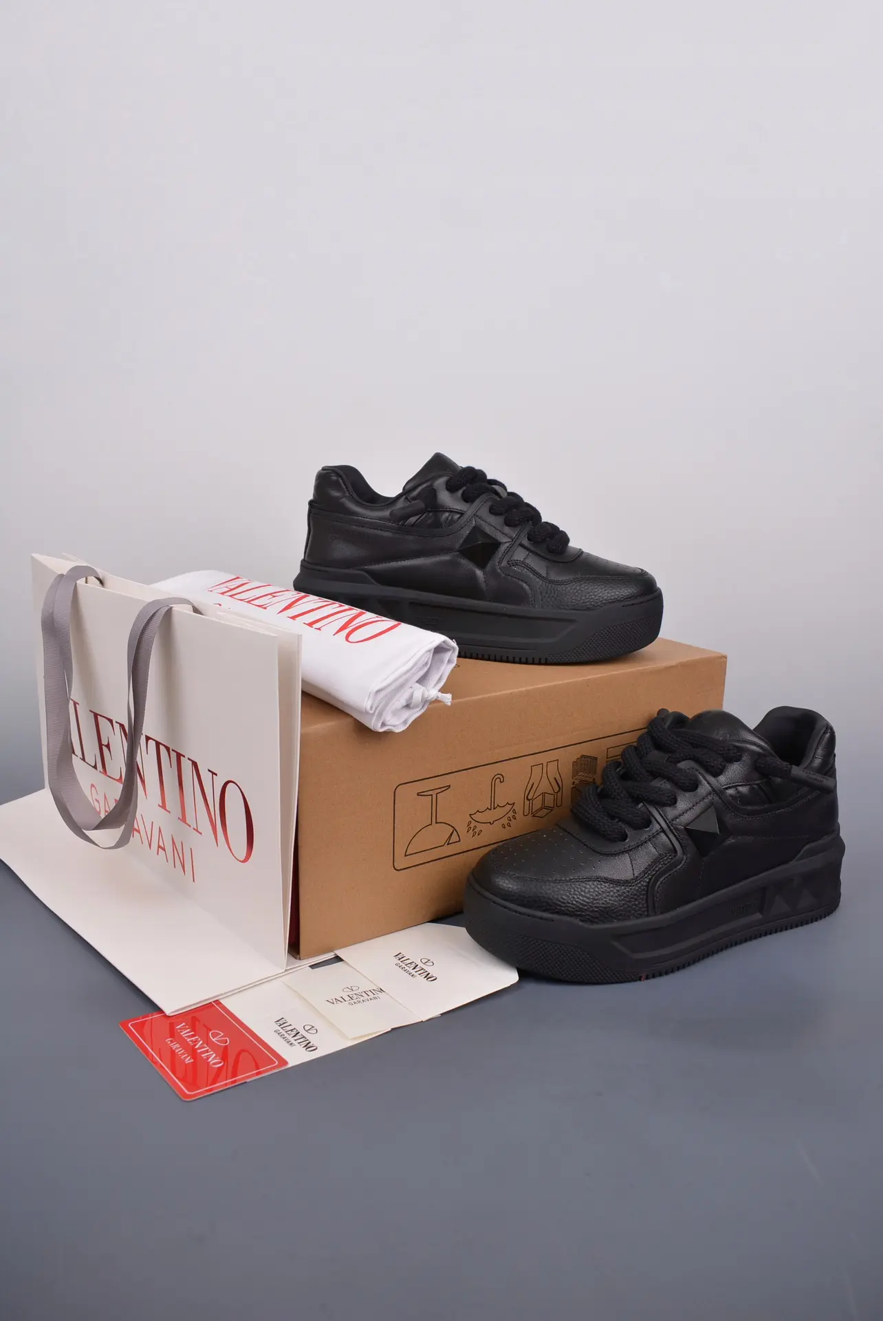 YASSW | Replica Valentino Men's One Stud XL Sneakers in Black - An In-depth Review