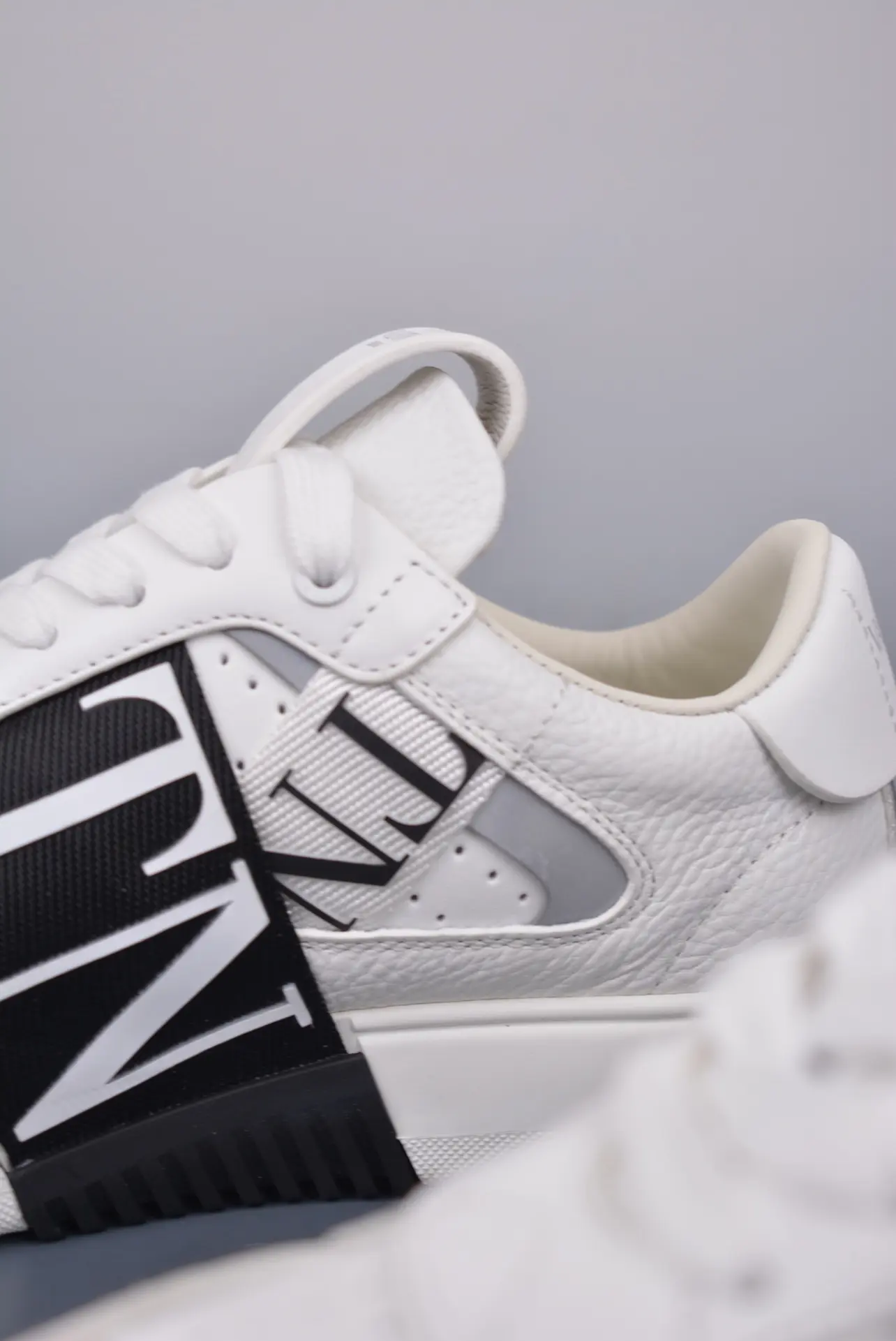 YASSW | Valentino Garavani VL7N Replica Sneakers: White Calfskin Perfection