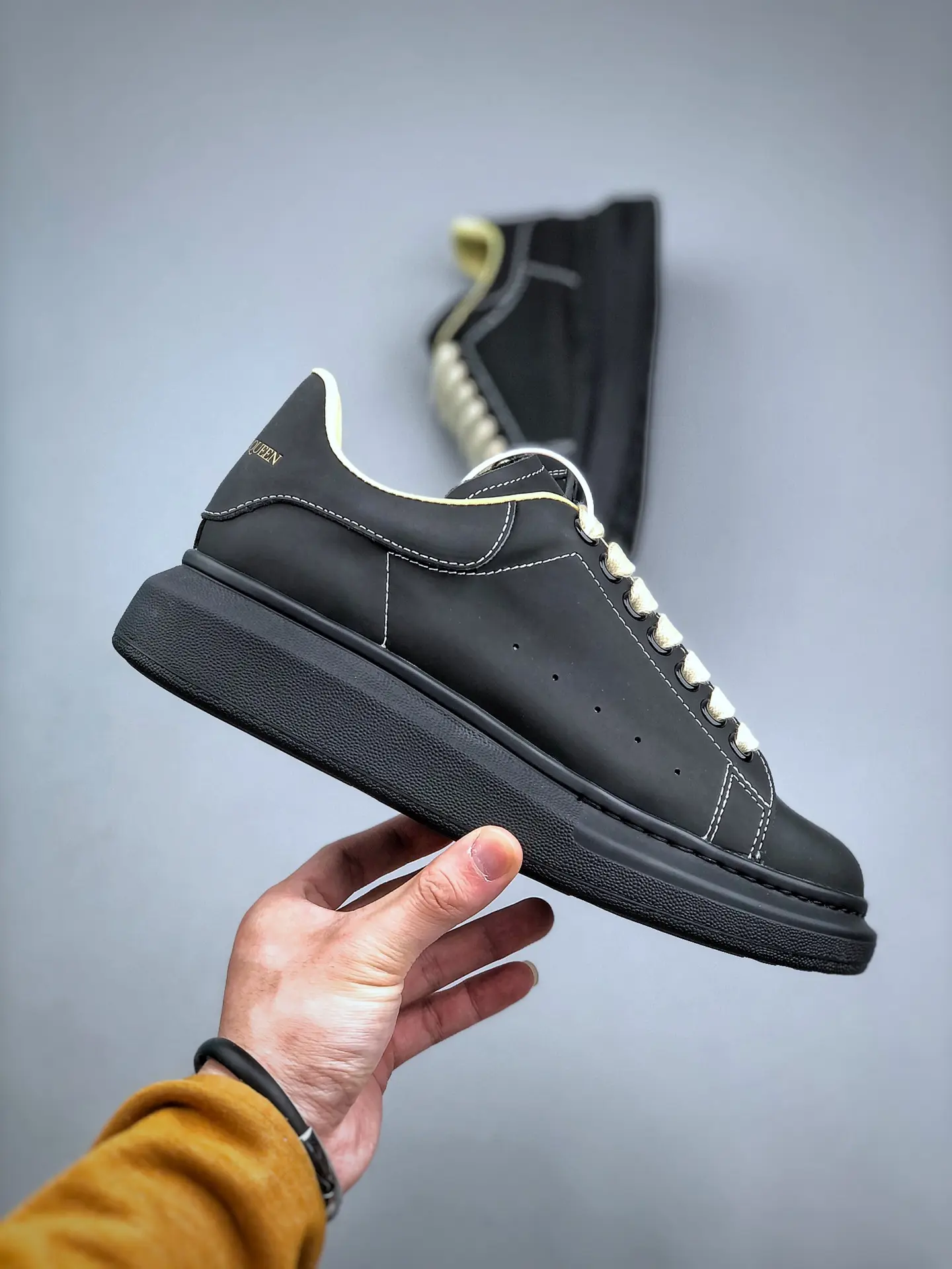 YASSW | Unveiling the Replica Alexander McQueen Oversized Sneakers in Black/Ivory