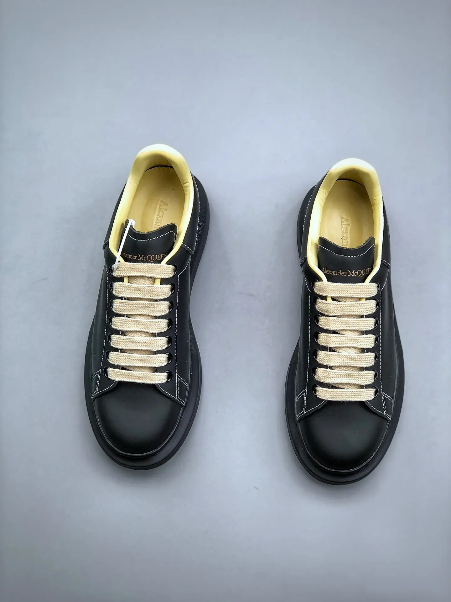 YASSW | Unveiling the Replica Alexander McQueen Oversized Sneakers in Black/Ivory