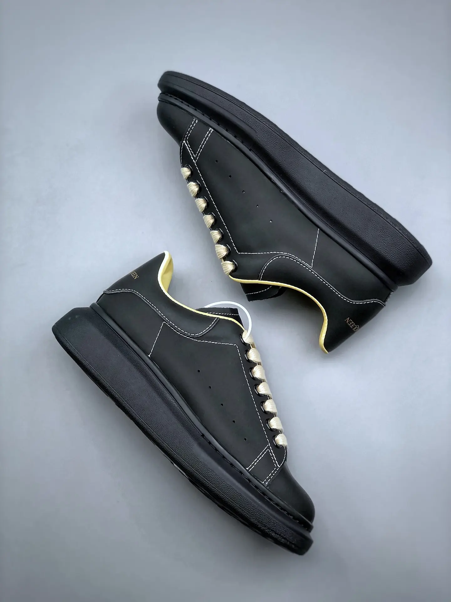 YASSW | Unveiling the Replica Alexander McQueen Oversized Sneakers in Black/Ivory