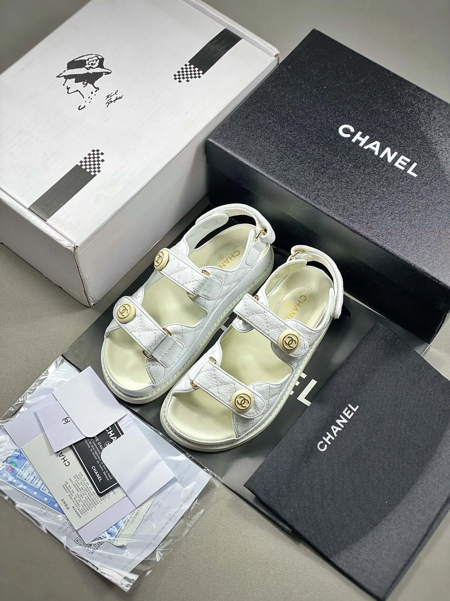 YASSW | Replica Chanel 21c White Caviar Gold CC Logo Mule Slide Strap Flat Teva Dad Sandals - A Luxurious Knockoff