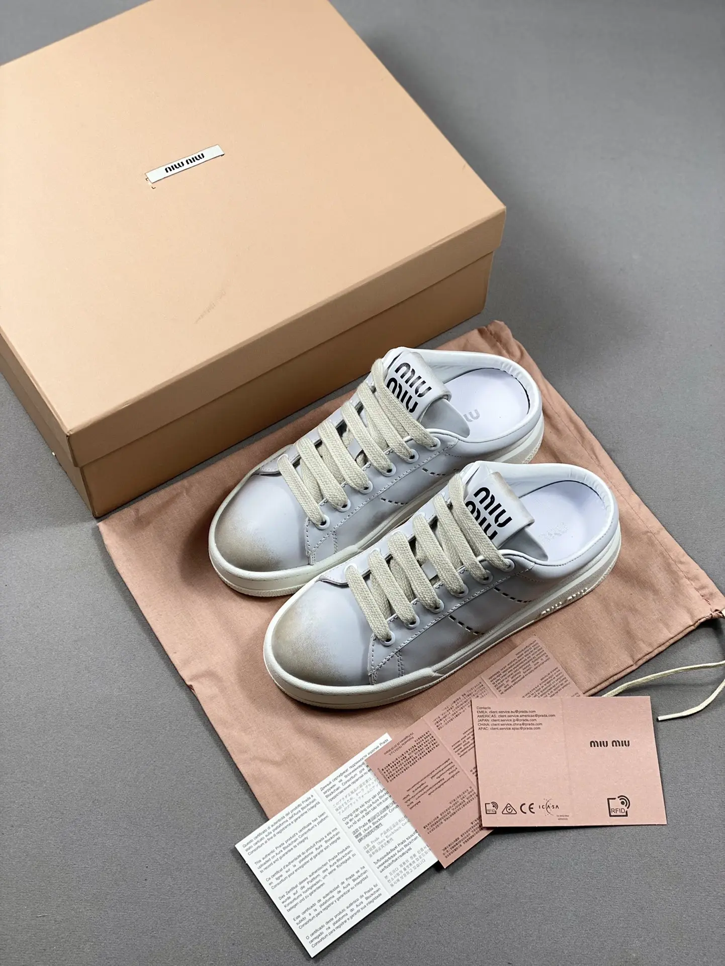 YASSW | Miu Miu Women Bleached Leather Sneakers - White Replica Review