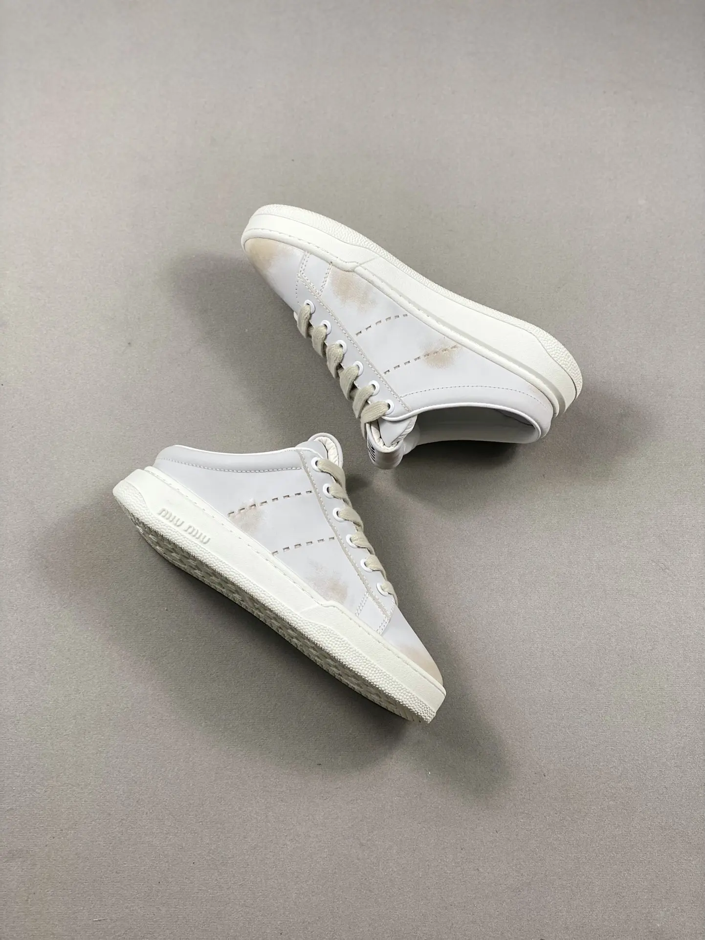 YASSW | Miu Miu Women Bleached Leather Sneakers - White Replica Review