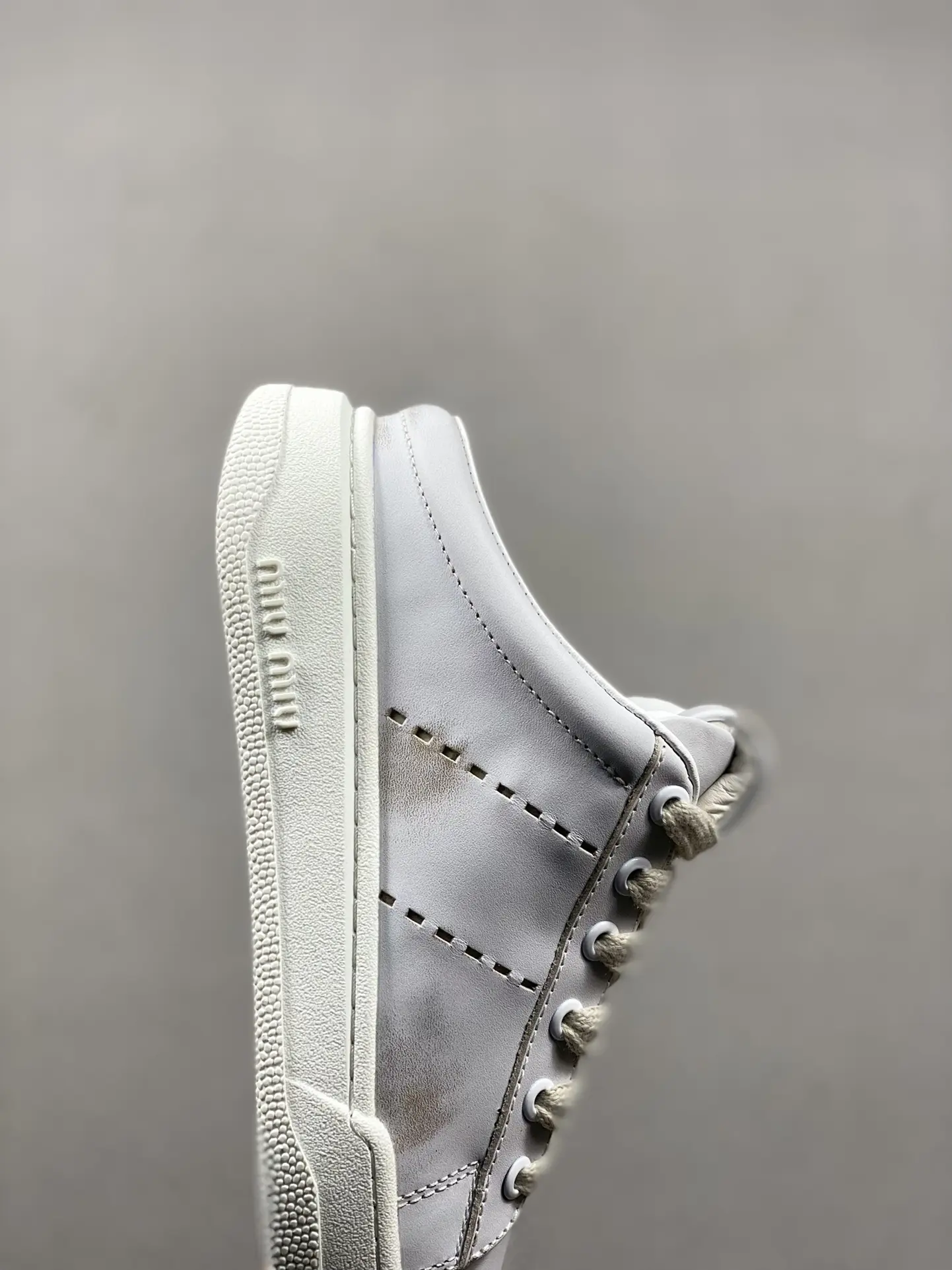 YASSW | Miu Miu Women Bleached Leather Sneakers - White Replica Review