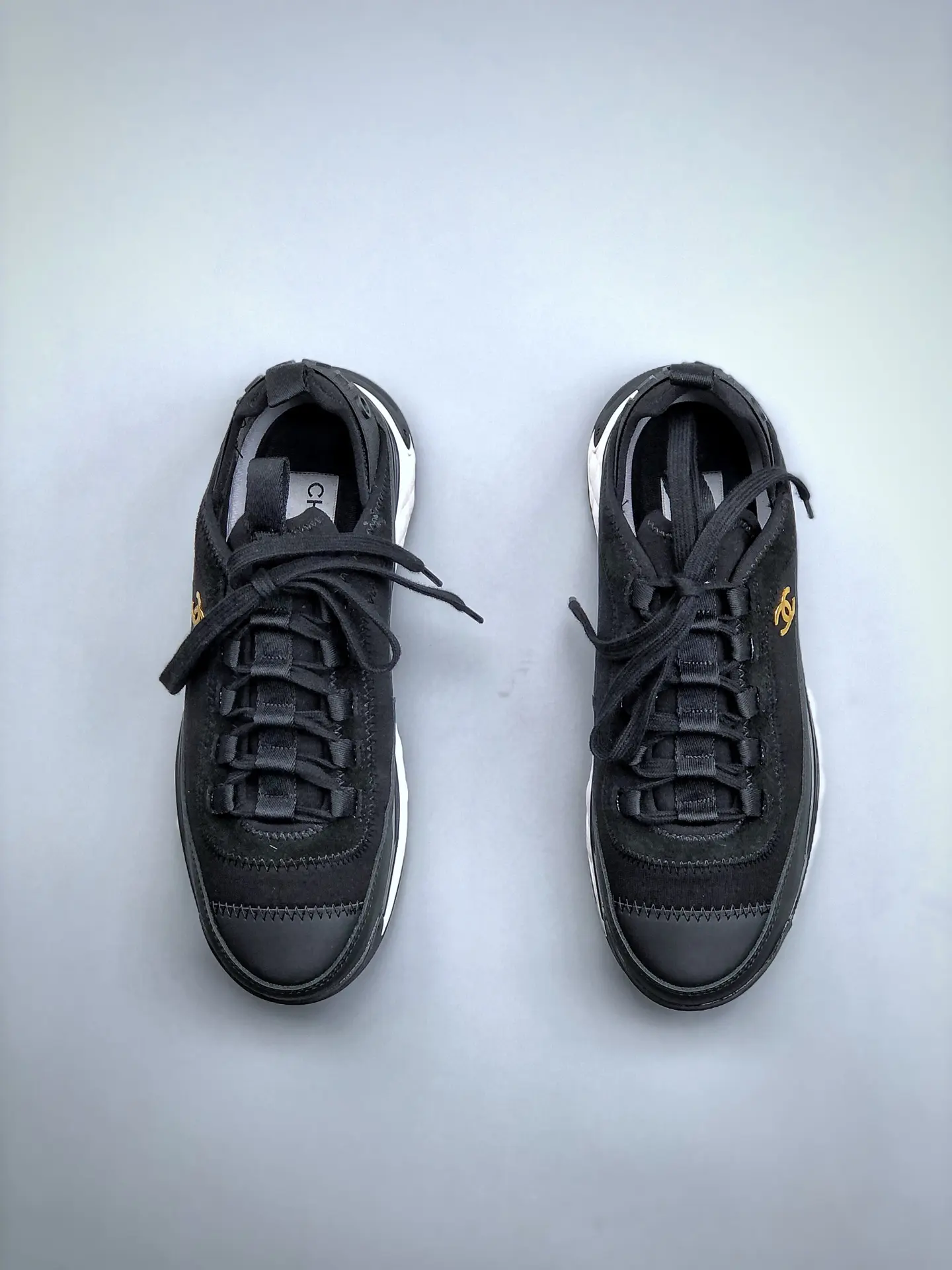 YASSW | The Ultimate Guide to Chanel Black 2020 Interlocking CC Logo Sneakers