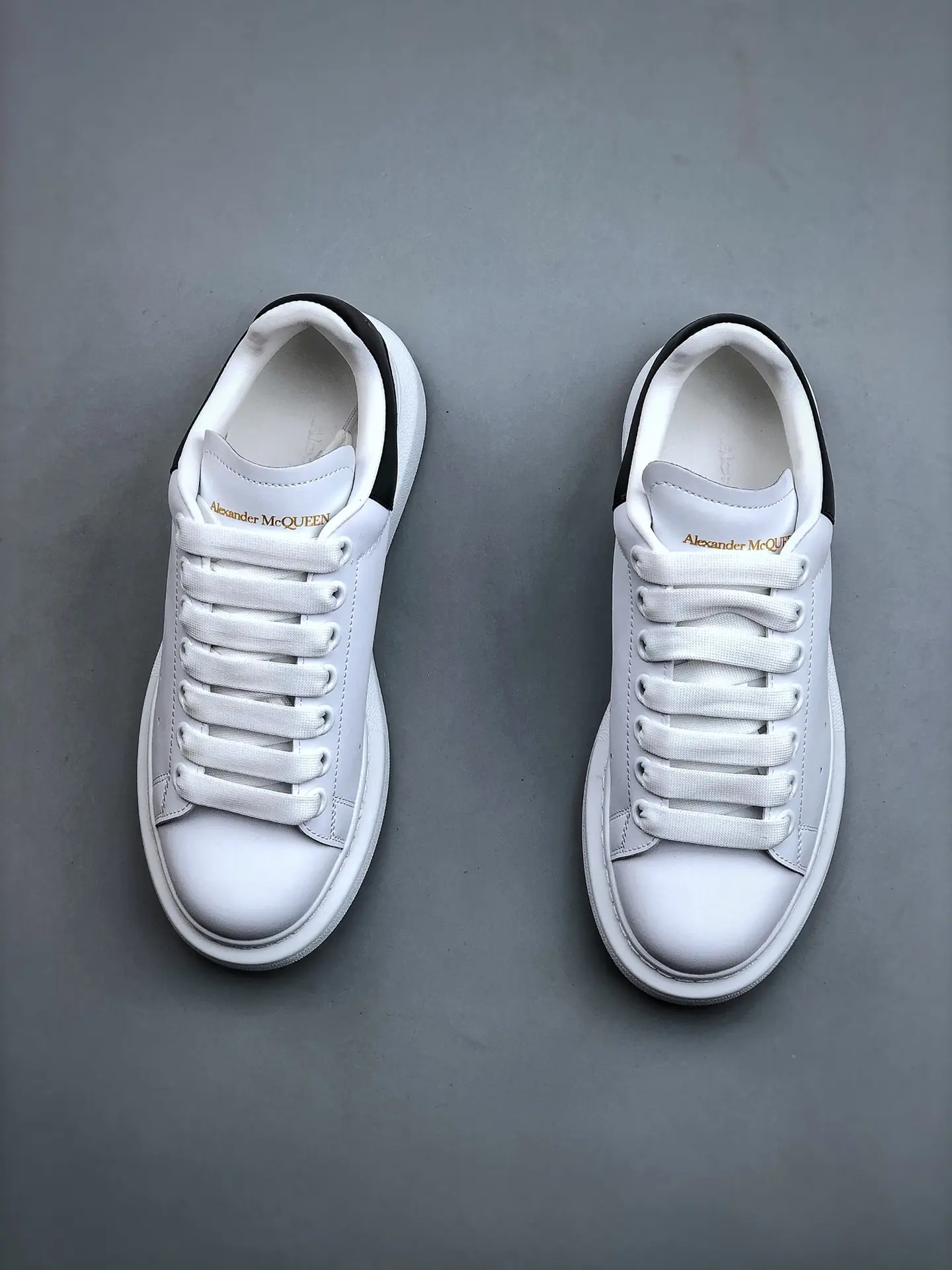 YASSW | Replica Alexander McQueen White and Black Leather Oversized Sneakers