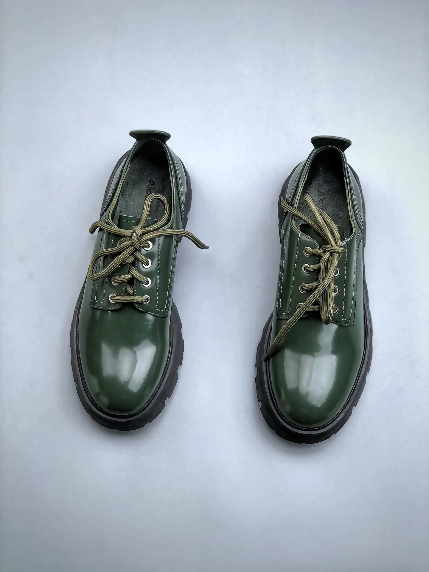 YASSW | Replica Alexander McQueen Lace-Up Platform Ankle Booties in Dark Green: An In-Depth Review