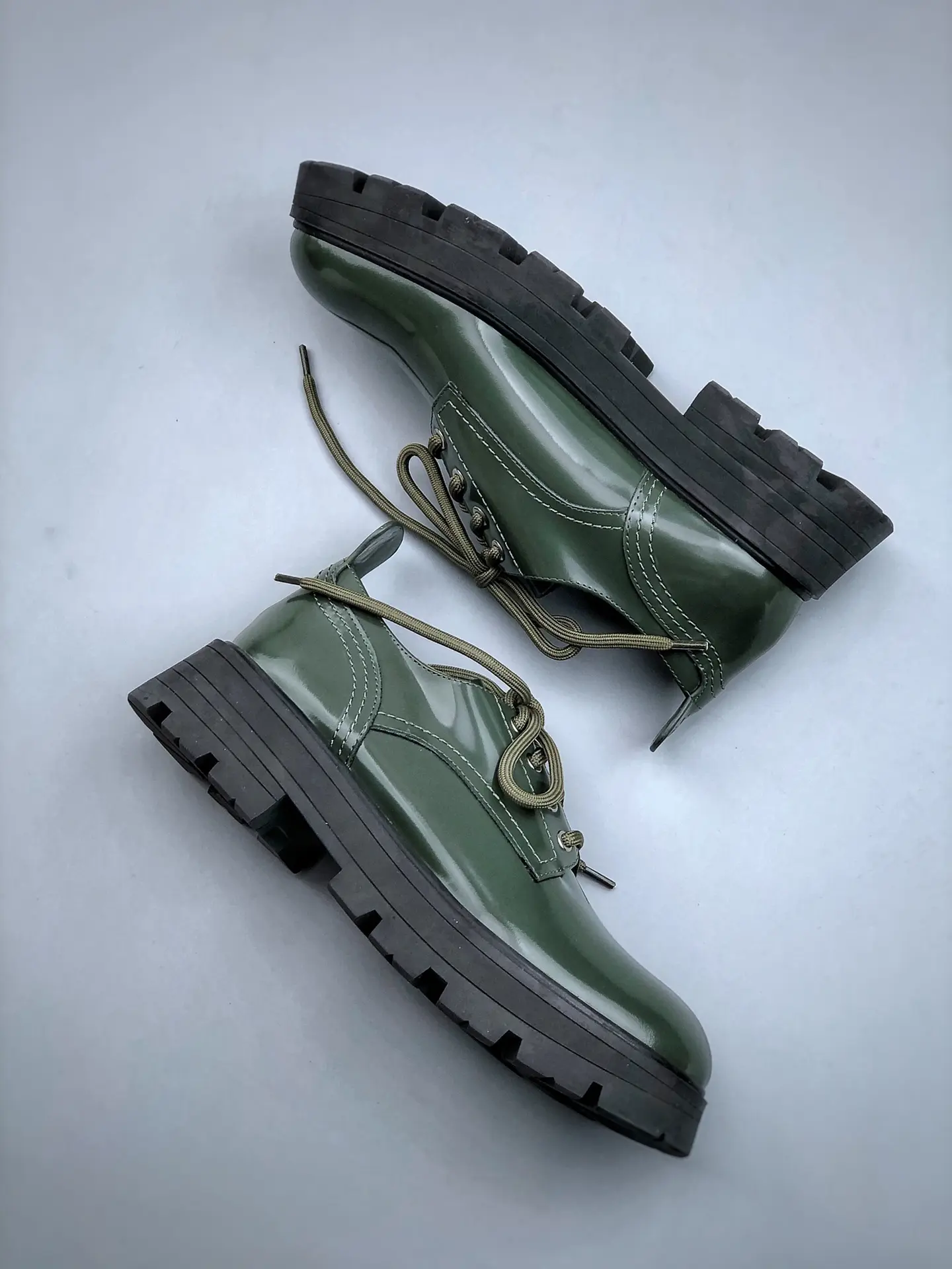 YASSW | Replica Alexander McQueen Lace-Up Platform Ankle Booties in Dark Green: An In-Depth Review