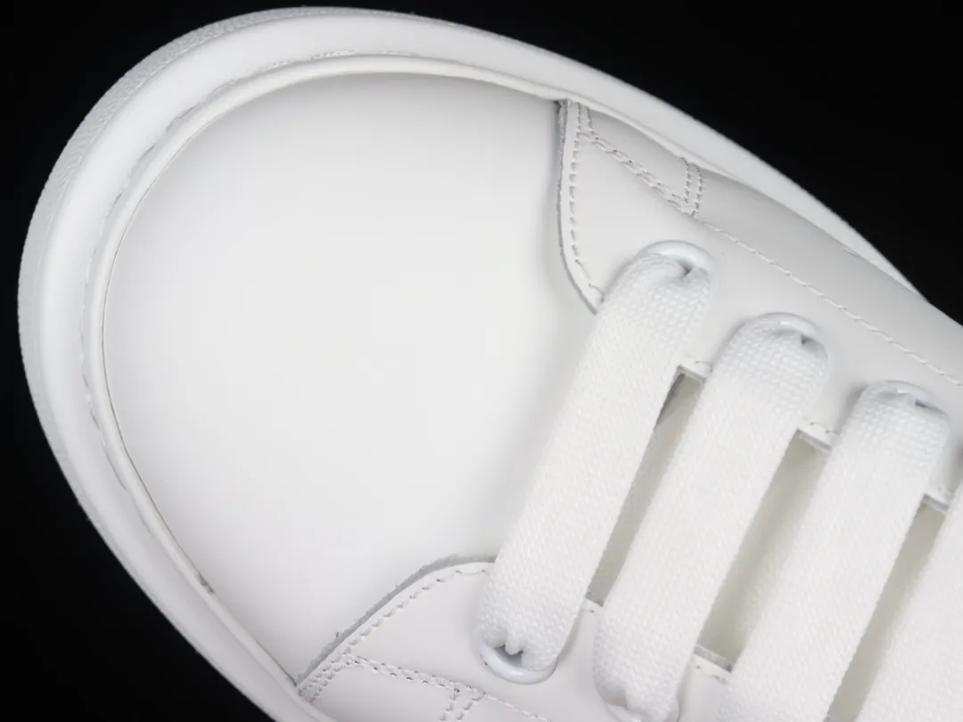 YASSW | Exploring the Allure of Alexander McQueen Oversized Sneakers: White & Blue